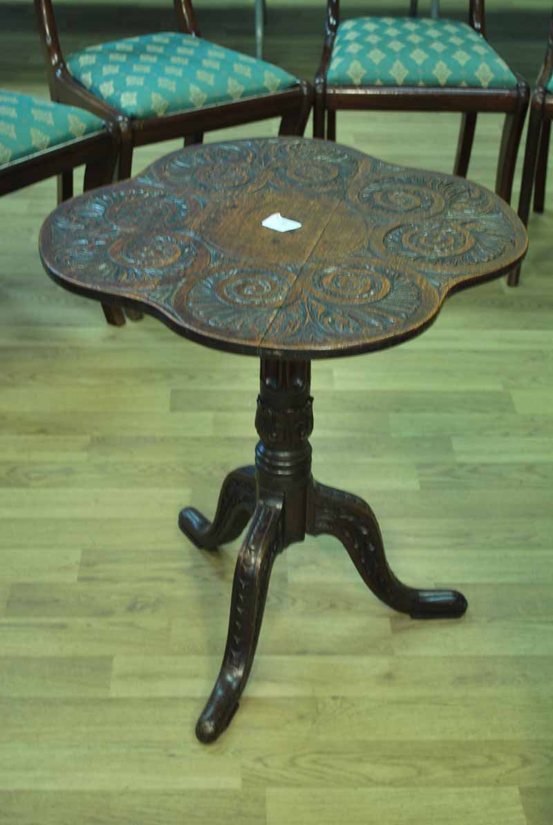 Carved Tilt top table circular shaped top