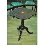 Carved Tilt top table circular shaped top