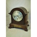 A Russells Ltd of Liverpool Edwardian silver dial Mantle Clock with roman numerals and three train