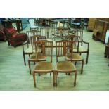 An Edward VII walnut parlour suite of two seat Settee, twin Armchairs and four Dining Chairs, the