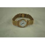 A Precista 9ct gold gentleman's Wristwatch on gate link 9ct strap 33g (42.5g gross)