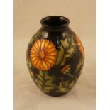 A Moorcroft Pottery bulbous vase in the Amelia Dandelion pattern, dated 2009 to the base 13 cm H