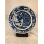 A pair of Republic period blue & White Chinese porcelain plates decorated with scenes of courtly