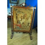 Gillow style rosewood Fire Screen with tapestry of Sir Walter Scott in his library, supported by