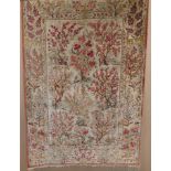 A good quality 20th century part silk Ghom Persian Rug, central panel depicting wild animals and