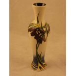 A Moorcroft Pottery slender baluster vase in the Persephone pattern by Nicola Slaney, designed