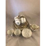 Royal Doulton Art Deco six setting coffee service with hand enamelled floral decoration and gilt