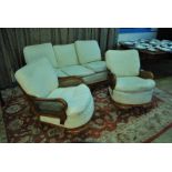 A mid century mahogany show frame Bergére Three Piece Suite with three seater Settee and a pair of