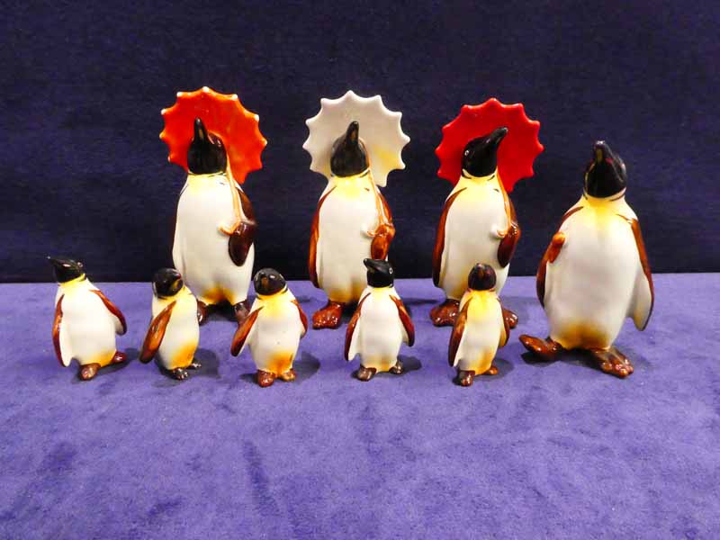 Beswick pottery a group of nine Penguins, three with Umbrellas, one other and five small examples