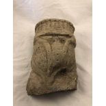 A gothic carved Stone Head of a King or Knight in armour, 34cm X 19.5cm