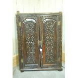 Carved oak panel front doors Corner Cupboard