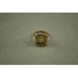 A 9ct gold citrine Dress Ring with heart shaped claw mounts Size O 7g gross