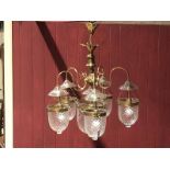 A mid to late 20th century brass five branch pendant lantern Chandelier, the lower bowl 23cm height,