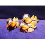 Beswick pottery, a graduated set of three Mandarin Ducks, approved by Peter Scott, number 1519
