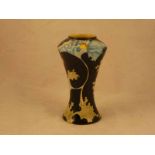 A Black Ryder Waisted Pottery Vase Designed By Kerry Goodwin in the Papaver pattern, marked TB and