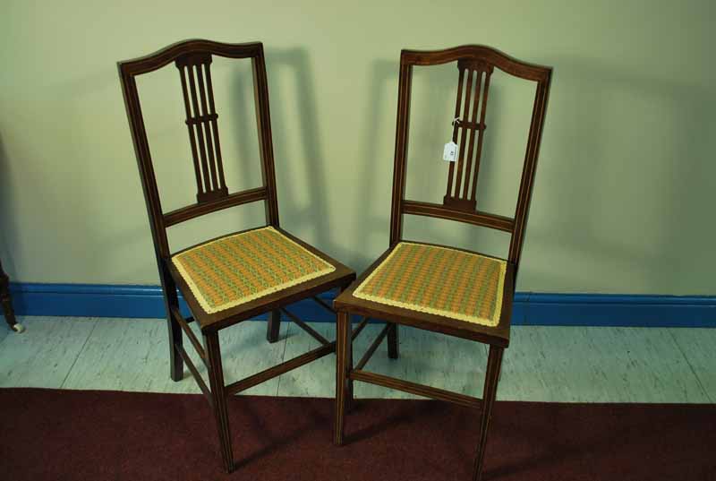 A pair of Edwardian mahogany Bedroom Chairs