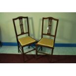 A pair of Edwardian mahogany Bedroom Chairs