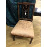 A late Victorian/Edwardian rosewood Nursing Chair, openwork classical design central splat, stuff