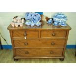 A Victorian mahogany two over two drawer cedar lined Wash Stand on bun feet