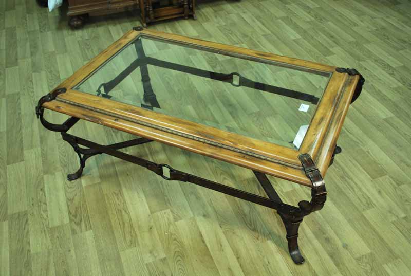 A distressed hardwood and leather work effect Magazine Table with bevelled glass insert, 115cm X