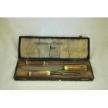 A 19th century antler handled cased Carving Set by John Wigfall and Co, Sheffield, England