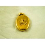 An 18ct gold Locket with monogram MC, 14g