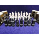 A Beneagles Scotch Whisky Chess Set, Historical Rose Version in wade porcelain, Henry VIII,