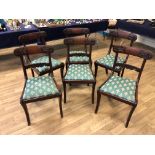 A set of six William IV mahogany bar back Dining Chairs, with lappet carved decoration and drop in