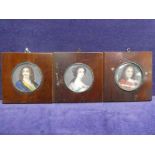 A set of three French 19th century Portrait Miniatures, depicting two noblemen and a noblewoman in