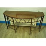 A Regency period 'Brighton Pavilion' mahogany Games Table with hinged top opening to reveal a netted