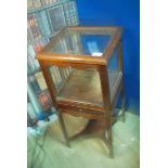 A 19th century mahogany display cabinet with single drawer on chamfered legs with cross stretcher