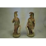 A pair of Royal Dux porcelain figure groups, one of Juno, the other Apollo, 26cm H
