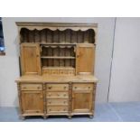 A 5ft long reclaimed pine Welsh Dresser of typical form with display back, 5ft long by 6ft high