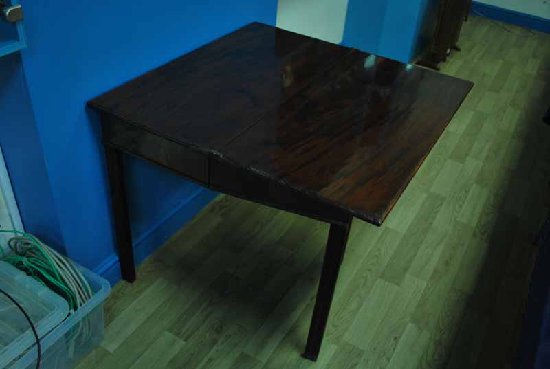 An early 19th century Georgian mahogany fold over Tea Table of rectangular form, hinged moulded edge - Image 2 of 2