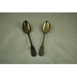 A pair of William II hallmarked silver fiddle pattern serving spoons, London 1832, by William Eaton,