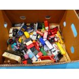 A mixed lot of play worn die cast and plastic model vehicles