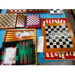 Two backgammon sets, Chinese chess set and three other chess sets