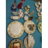 A mixed lot of ceramics to include plates, wall pocket, dishes, figurines & pheasant decorated ware