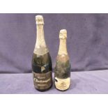 A magnum of champagne, Charlemagne reserve Demi sec and a bottle of Bruno Paillard champagne