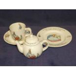 A wedgwood childrens breakfast service to include, cup, saucer, sideplate & teapot. Peter Rabbit
