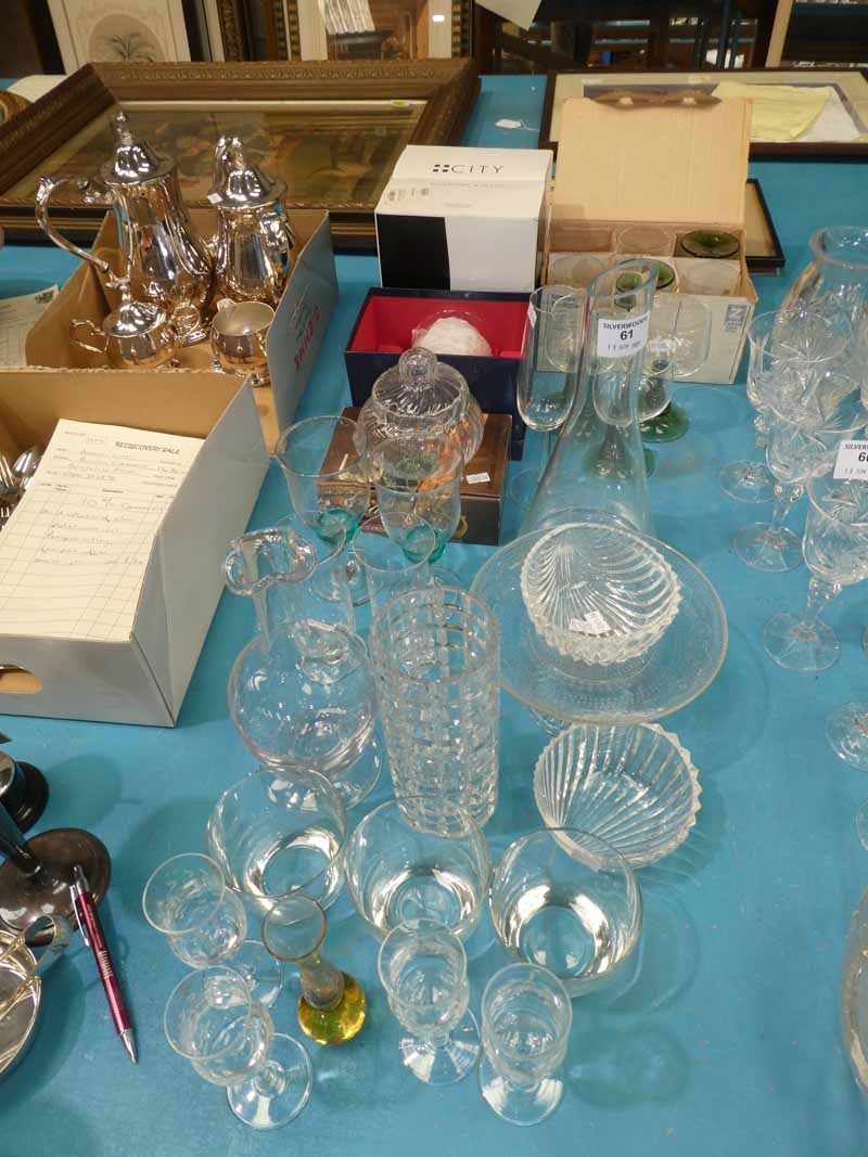 A collection of mixed glassware to include decanters, vases etc