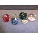 Six glass paperweights to include Caithness Moonflower, 2 wedgwood etc