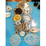 A collection of plated ware, pressed glass and stainless steel tableware