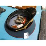 A Russian military cap, opera glasses, coin holder, penknife, lighter, LNER buttons and box