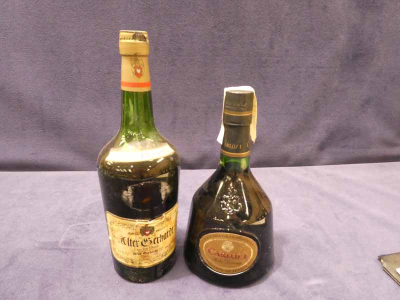 A bottle of Weinbrand VSOP Alsace brandy 70cl, 38% vol and a bottle of Carlos I Brandy de Jerez,