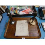 An oak two handled tray with two bronze patinated figures and a signed 1955 royal performance