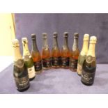 Nine bottles of sparkling rose and other sparkling wines