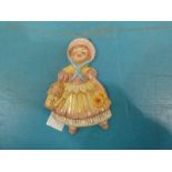 A Pendelfin pottery wall plaque a sleeping girl wearing a bonnet, glazed polychrome enamels, 14cm