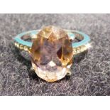 Ladies dress ring with pink gem stone
