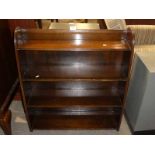 A 1930's mahogany open fronted floor standing small bookcase